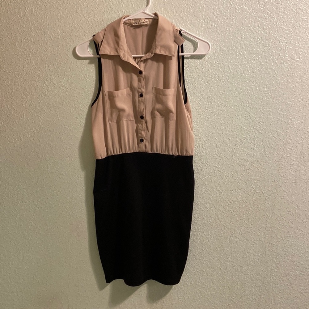 Size S Women’s dress with a tan shirt top and a black bottom